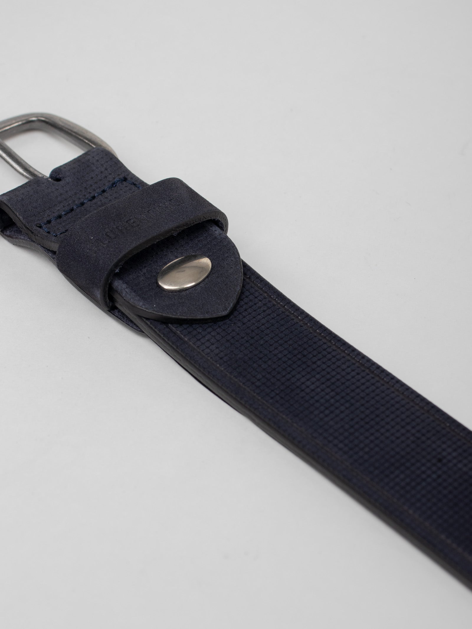 Embossed leather belt